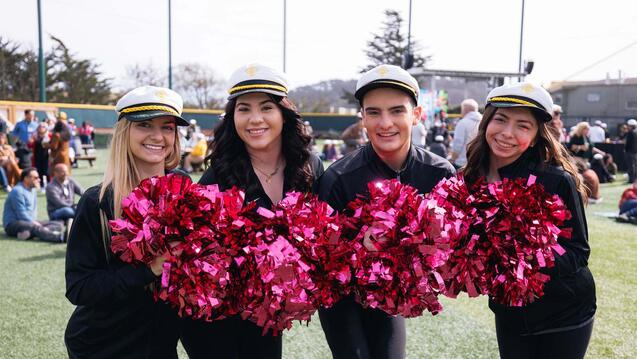 USF students holding pom poms