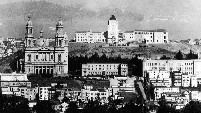 USF Lone Mountain in 1932 with St Ignatius church seen in the foreground