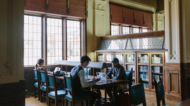 Students sitting at a desk