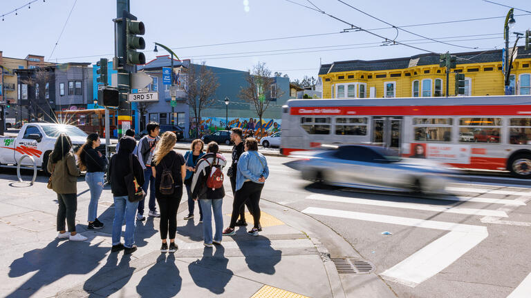 group of students standing on a San Francisco street corner
