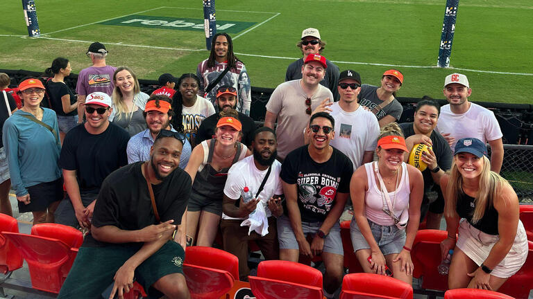 group of sport management students at stadium