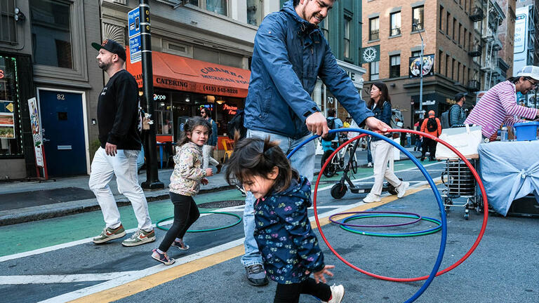 Child playing in the street.