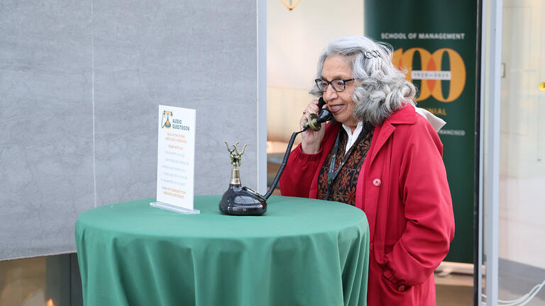 person holds telephone