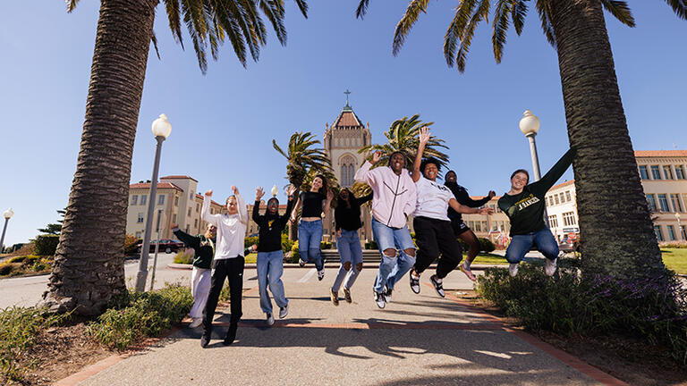 Students jumping for joy