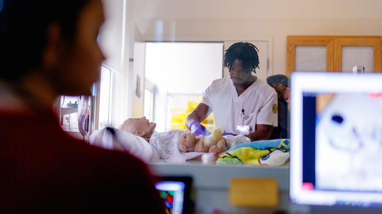 student works in nursing sim lab