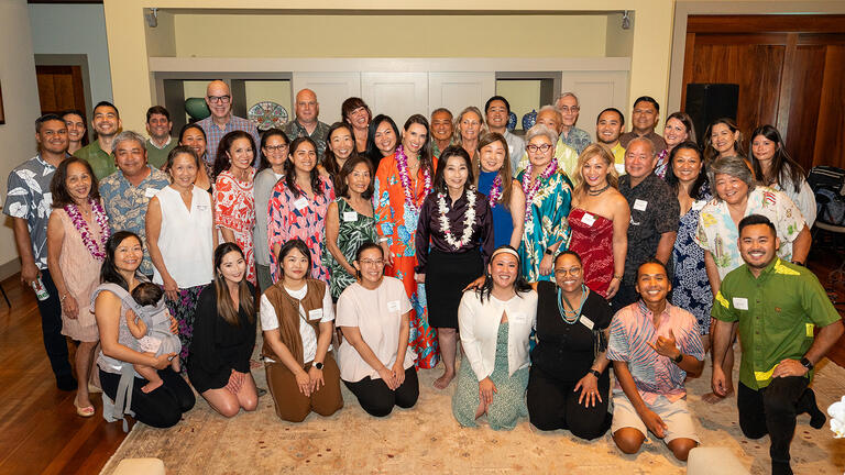 Alumni gather for reception in Honolulu on April 3.