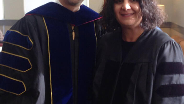 Annie Adamian and Dean Kevin Kumashiro on graduation day.