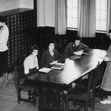 Claire Weidenmuller at the catalog in the Gleason Library reading room, 1933.