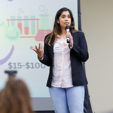 Person talking on stage