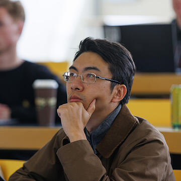 student listens in class