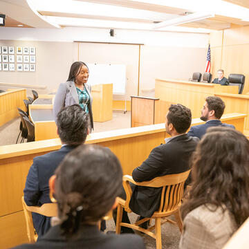 Law student speaking in court.