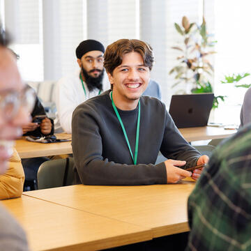 USF student smiling in class