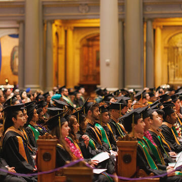 school of management graduates inside st.ignatius church