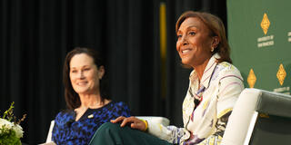 Jennifer Azzi and Robin Roberts on stage