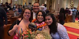 Rebeca Chavez with family at graduation ceremony