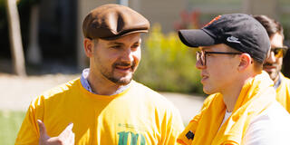 two people talking at Celebrate USF