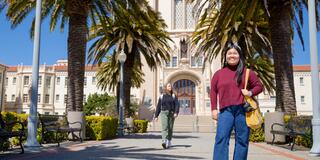 Students on Lone Mountain surrounded by palm trees