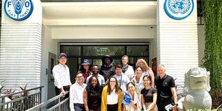 Students posing in front of UNFAO building