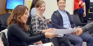 YMCA employees handed out flyers to the visiting students.